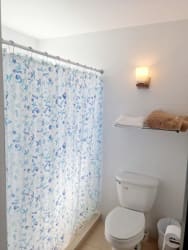 Bathroom with marble countertop and large mirror in Villas Decameron golf resort home Panama