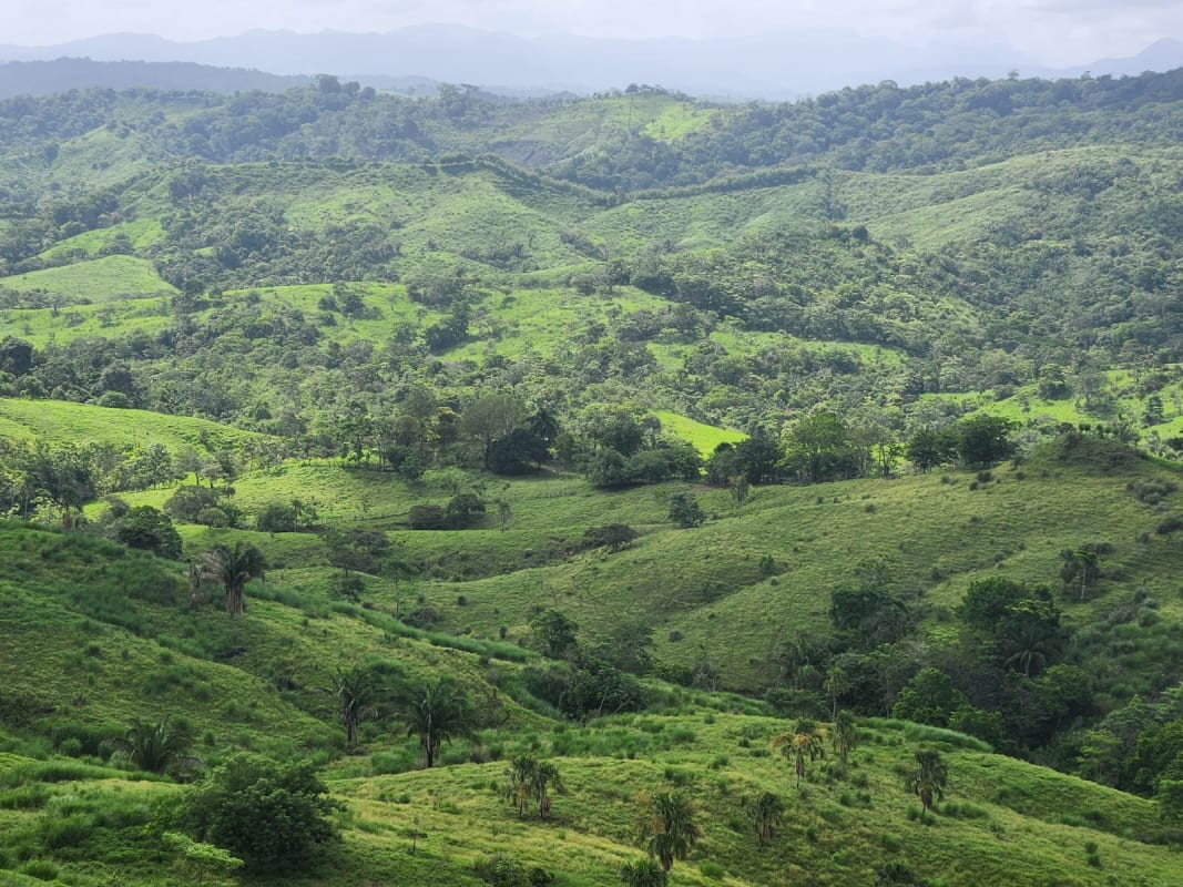 Aerial farmland photo with hills and mountain background near Canitas Chepo Panama