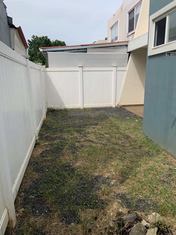 Kitchen space with cabinets and tiled backsplash PH Alpes Brisas del Golf