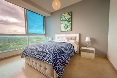 Open-concept kitchen with granite countertops in beachfront Royal Palm apartment in Gorgona Panama