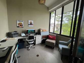 Covered terrace with garden view in private yard PH Nativa Panama Pacifico house