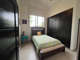 Modern bathroom with double sink vanity glass shower house PH Nativa Panama Pacifico