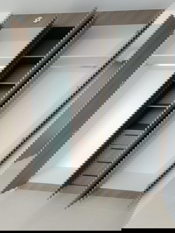 Outdoor swimming pool with relaxation area in CenterPoint Tower Panama City