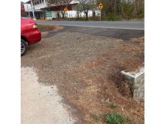 Vacant land near highway in Aguadulce with sidewalk and vehicle access