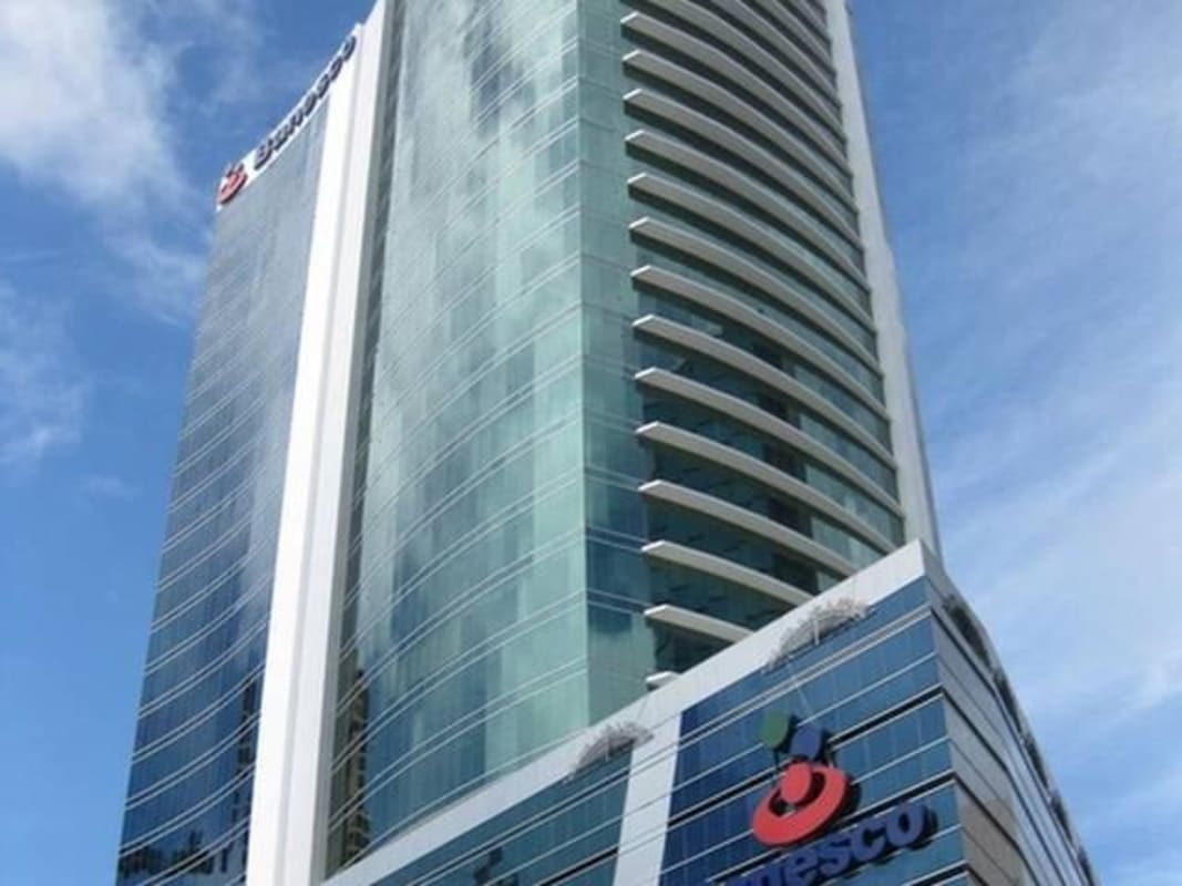 High-rise commercial building with modern glass facade Torre Banesco Ocean Business Plaza Panama