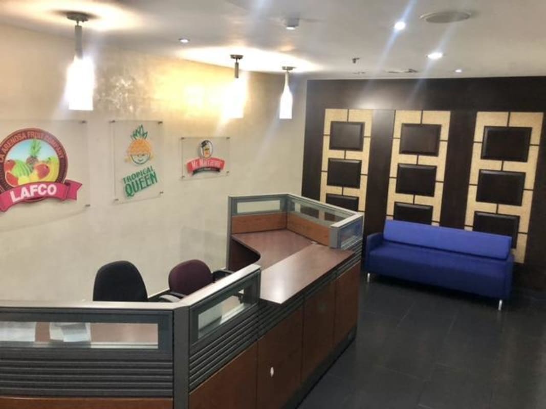 Marble reception with logo signage, welcome lobby Ocean Business Plaza Marbella Panama City