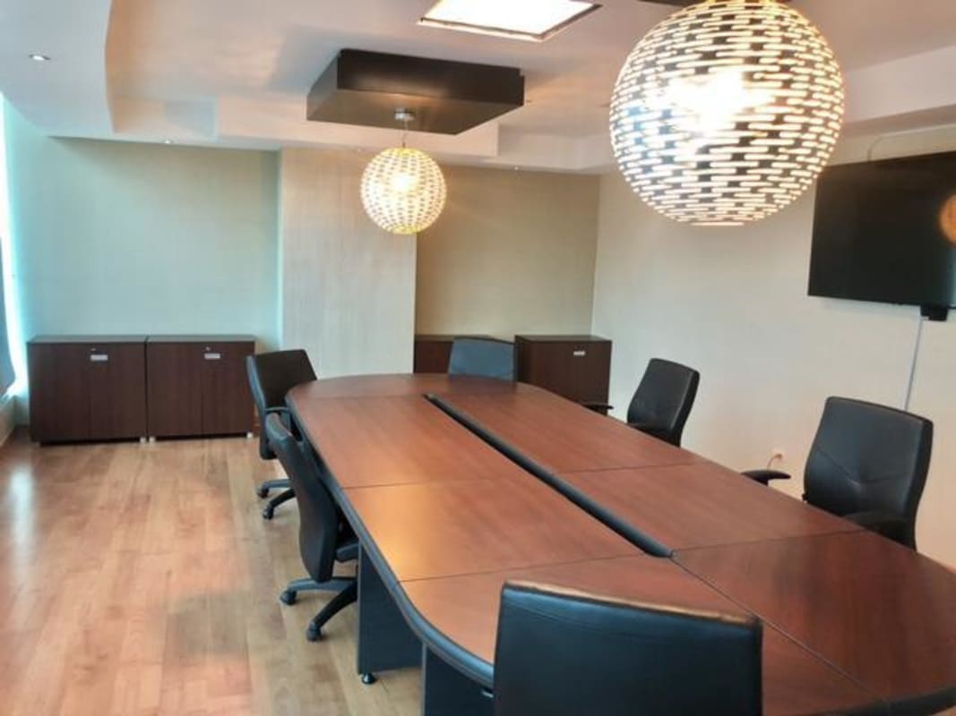 Private executive office with panoramic windows overlooking Panama skyline in Ocean Business Plaza Marbella