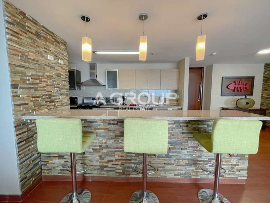 Elegant bedroom with floor to ceiling windows and ocean city view Dupont Punta Pacifica