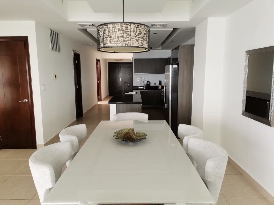 Contemporary kitchen with granite countertops and stainless steel appliances at PH BICSA Financial Center Panama City