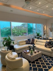 Elegant living and dining space in Punta Barco remodeled condo near Coronado