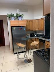 Spacious bedroom with large window and modern finishes Punta Barco Village Panama