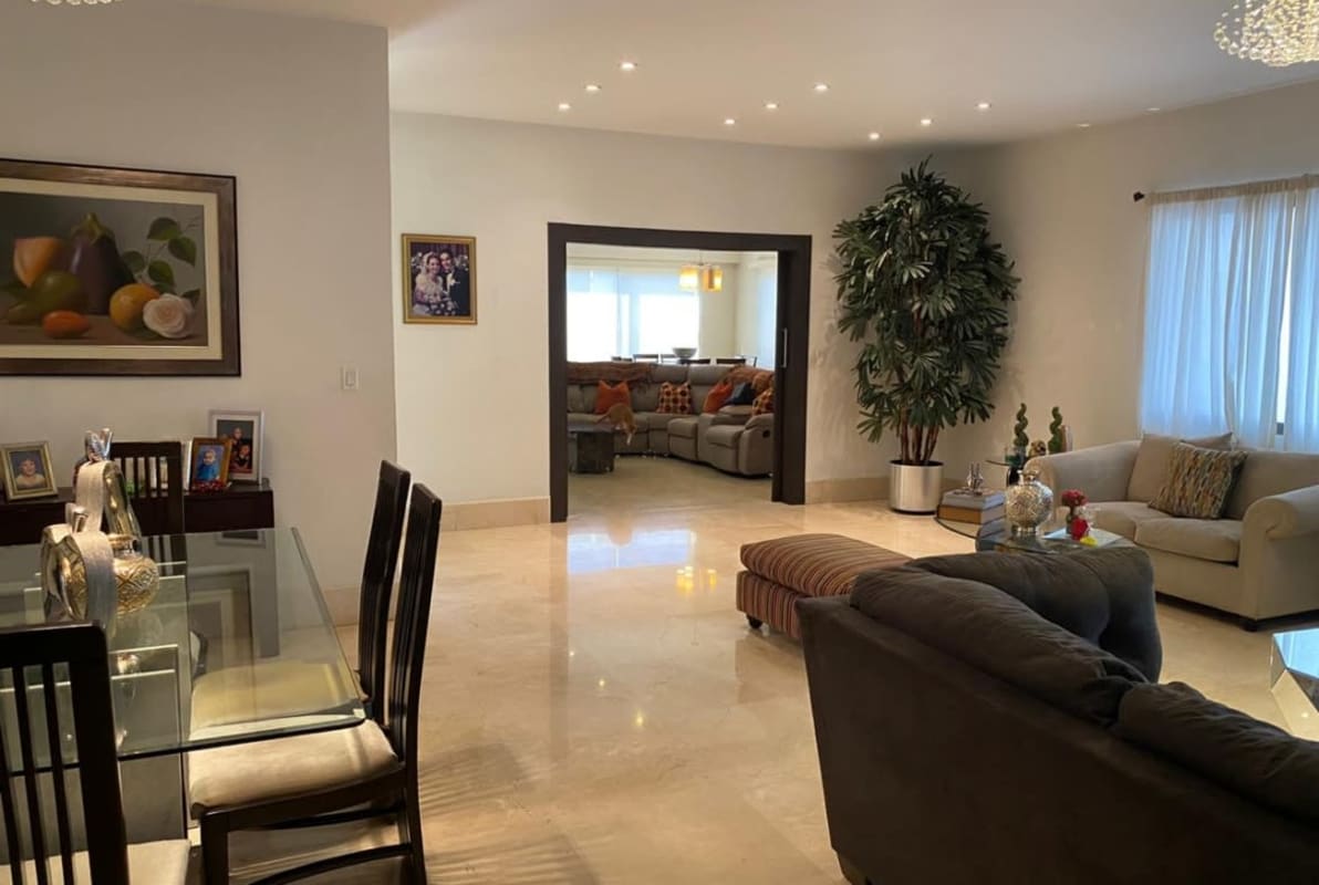 Contemporary open-concept living dining with marble floors, large windows in Panama El Carmen