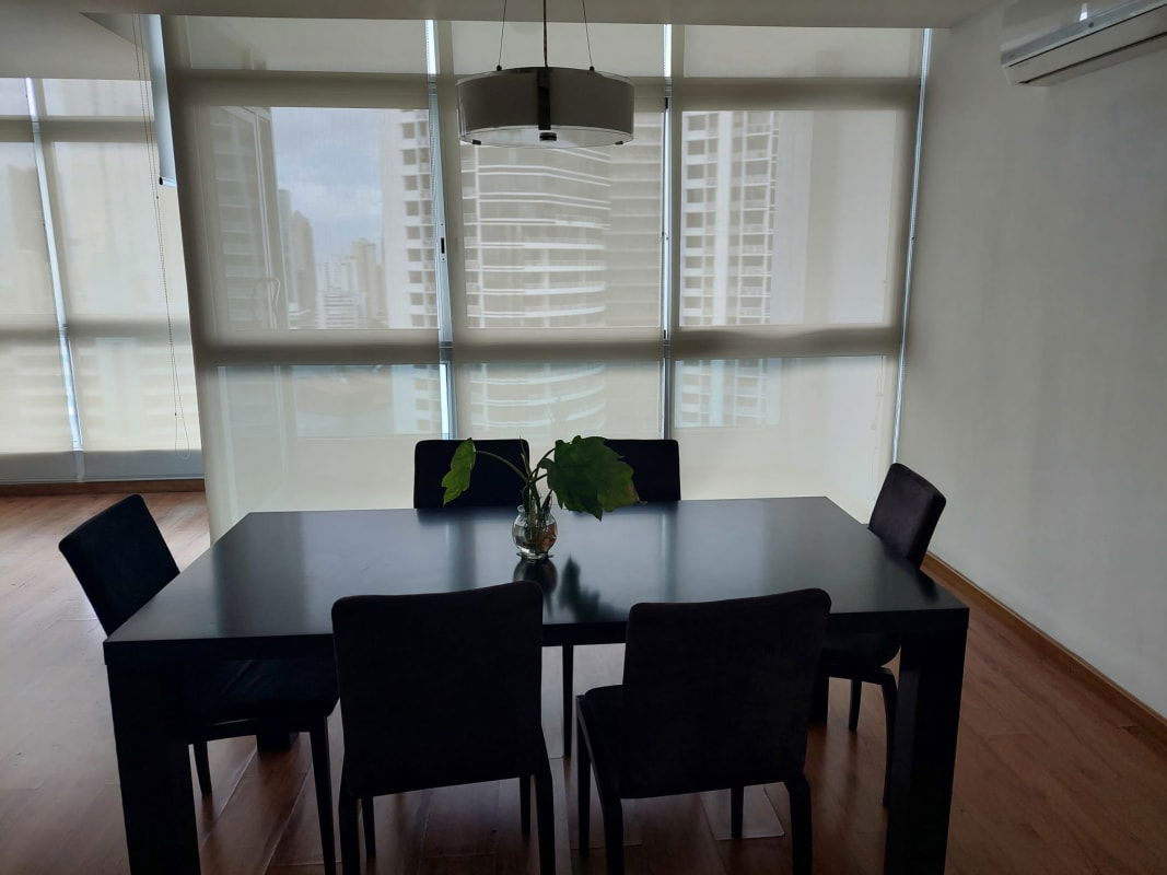 Master bedroom with floor-to-ceiling windows, ocean views and ensuite bathroom in PH BICSA Avenida Balboa Panama