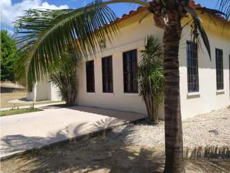 Private pool with sun deck, outdoor terrace and palm trees in Hacienda Pacifica San Carlos Panama