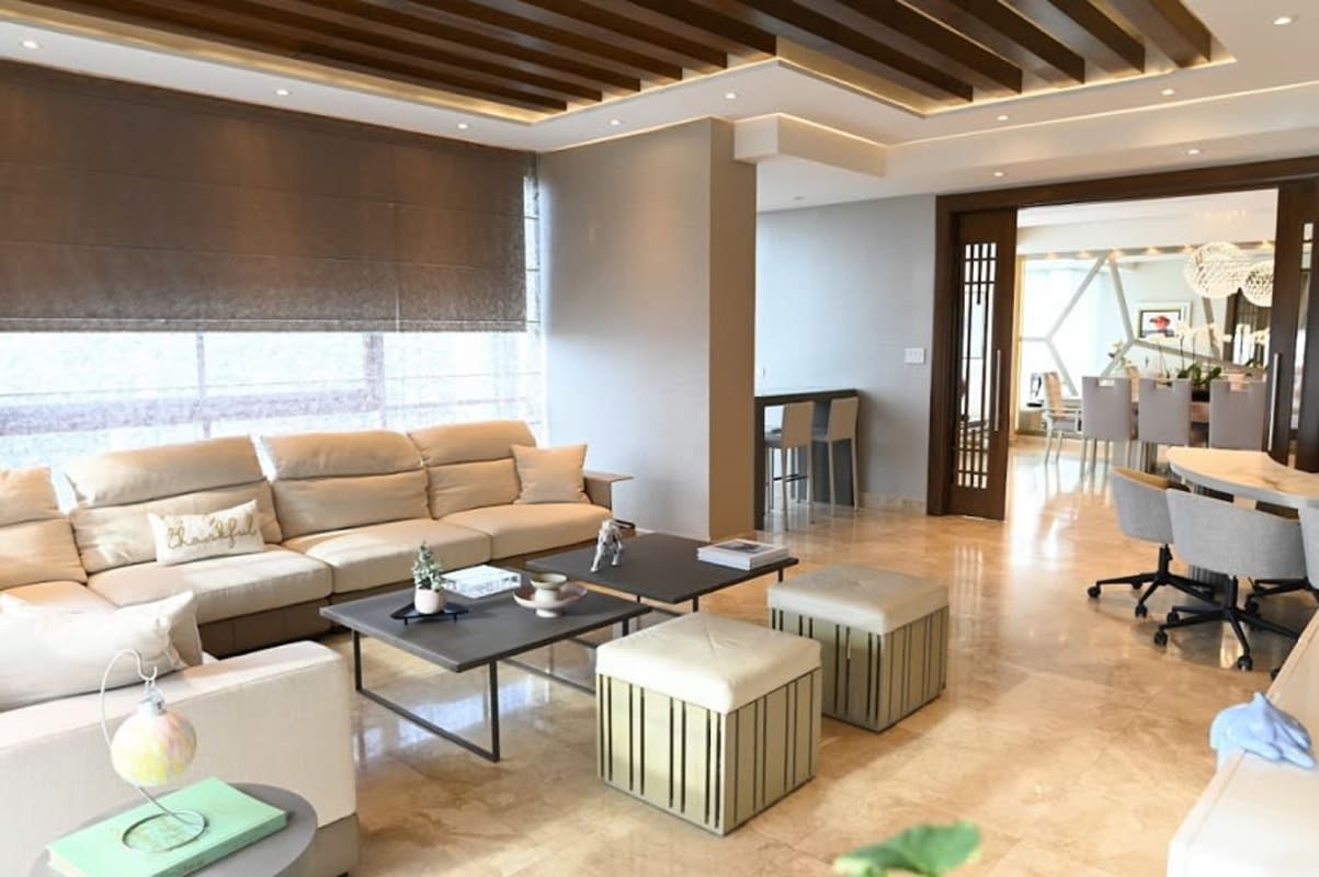 Elegant master bedroom with large windows overlooking ocean PH Titanium Costa del Este