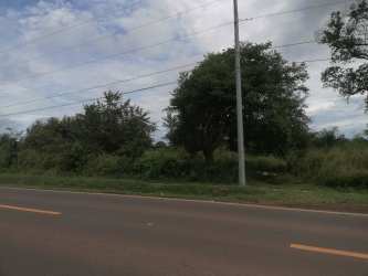 Retail and bus stop area with pedestrian bridge Aguadulce near Interamericana Panama