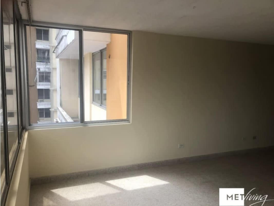 Living space featuring large windows and balcony PH Villas Las Fuentes Betania Panama