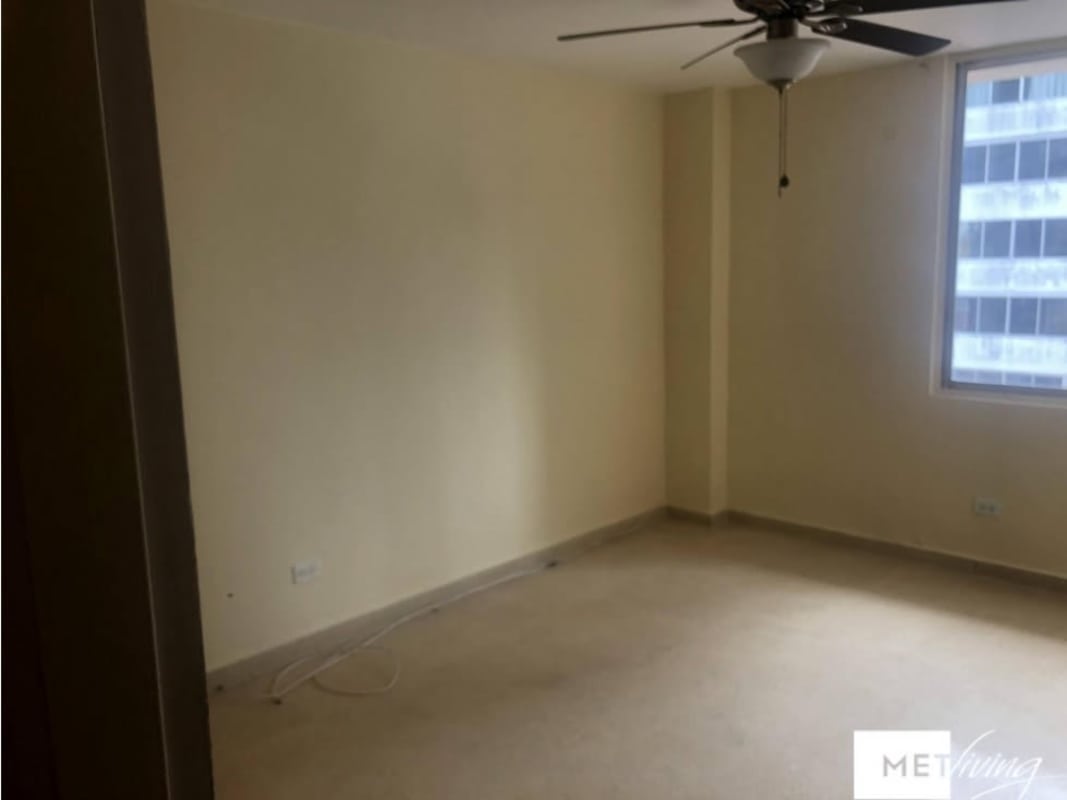 Bedroom with ceiling fan and urban city views PH Villas Las Fuentes Betania Panama