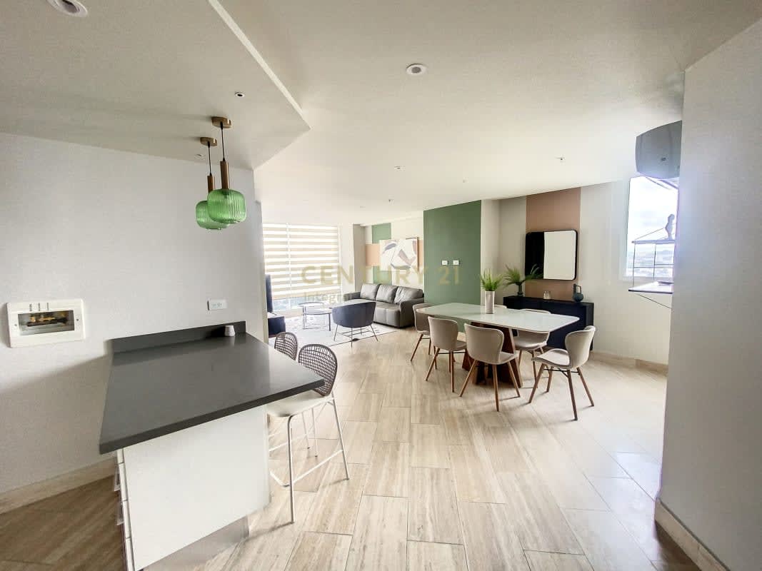 Open concept living dining with natural light and balcony at PH The Towers luxury condo Panama City