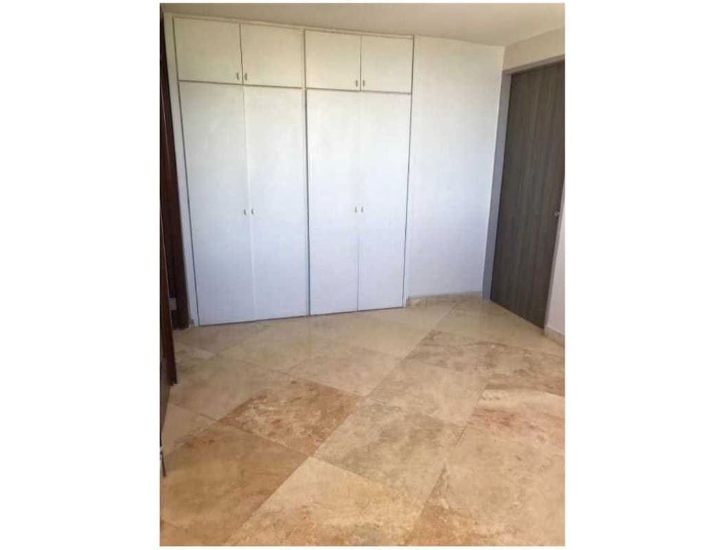 Large bedroom with windows city ocean views PH Rocamar Panama City