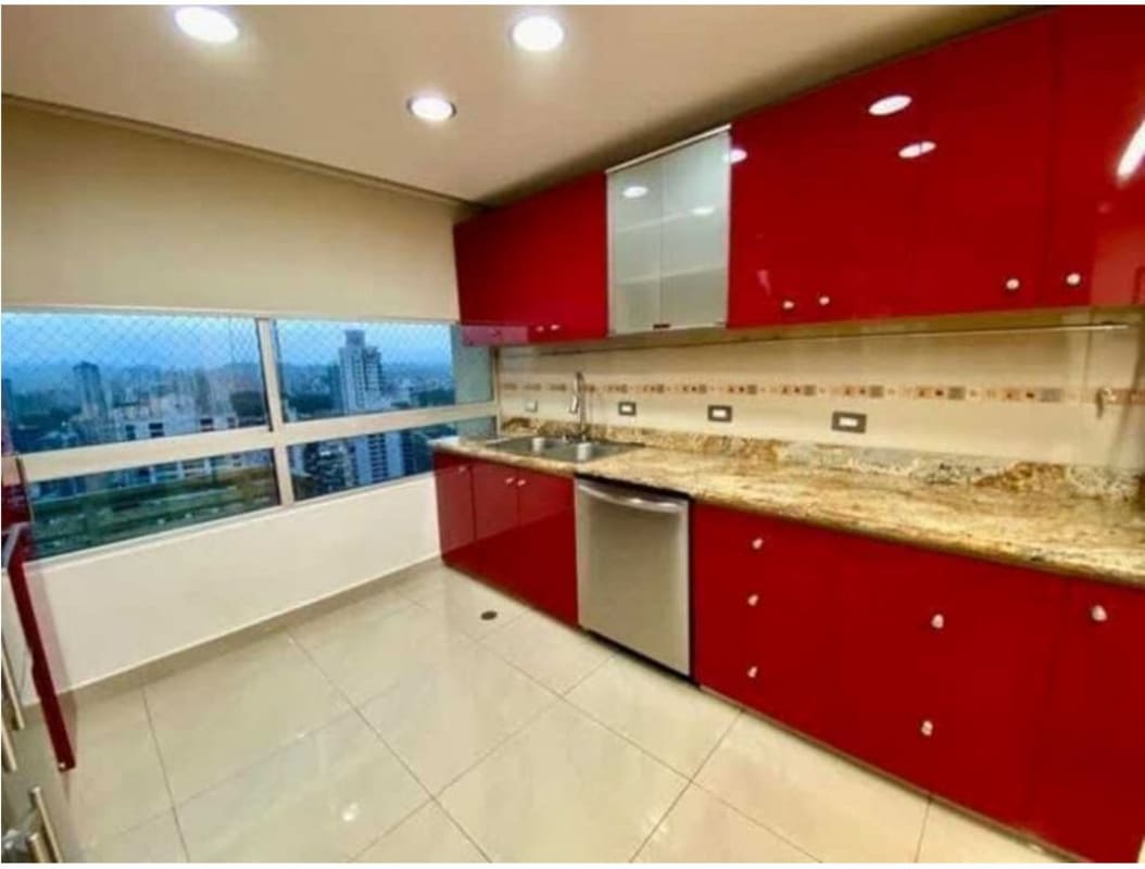 Living room with panoramic ocean views, large windows and marble floors in PH Terrasol penthouse Panama