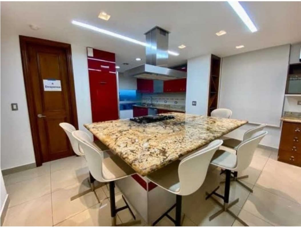 Luxury bathroom featuring freestanding bathtub, double vanity and mosaic accents in PH Terrasol penthouse Panama