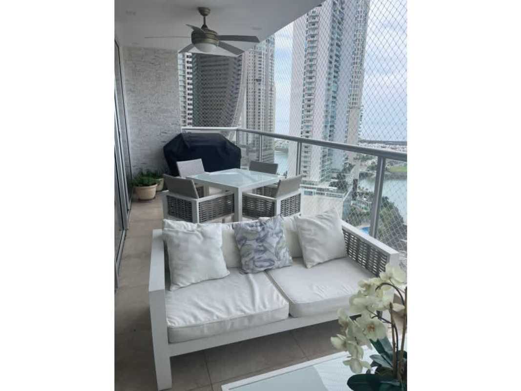 Spacious wrap-around balcony with ocean view and outdoor dining at PH Q Tower Punta Pacifica, Panama