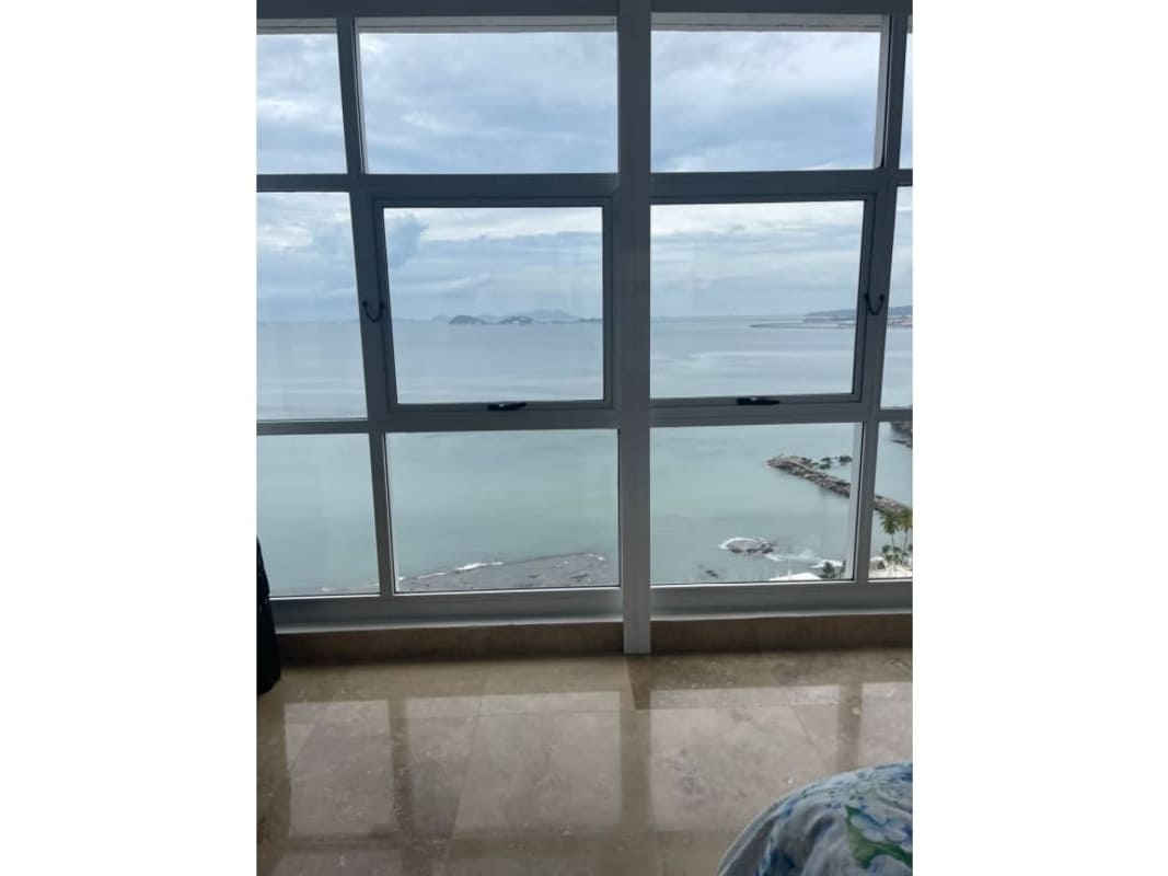 Kids bedroom with pink themed decor, twin beds, sea views at PH Q Tower Punta Pacifica Panama