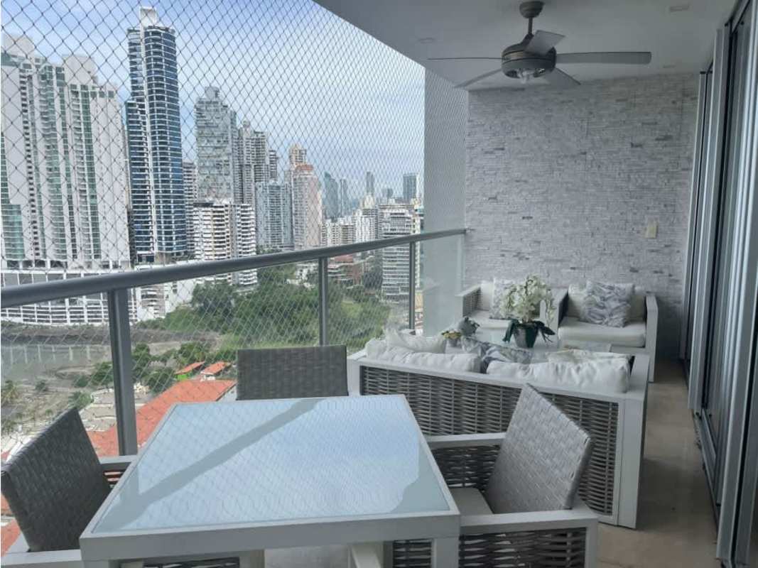 Luxury bedroom with large windows and ocean views at Q Tower Pacifica Panama
