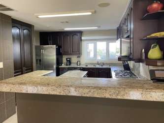 Large master bedroom with balcony golf views ensuite bathroom in Tucan villa Panama