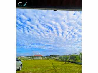 Expansive fenced green yard perfect for building or gardening in Coclé region Panama