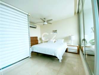 Oceanview master bedroom with large window, modern design PH Casa Bonita Playa Bonita Panama