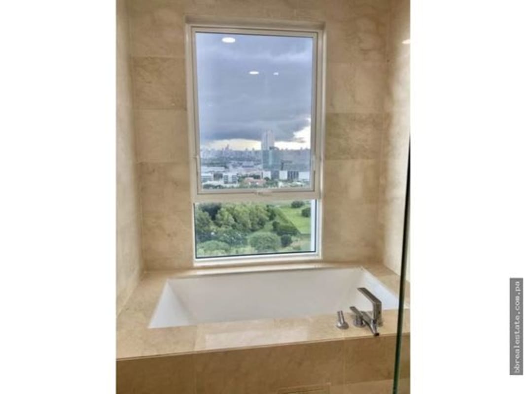 Chef-designed Italian kitchen with granite counters appliances and window at PH Aria Panama