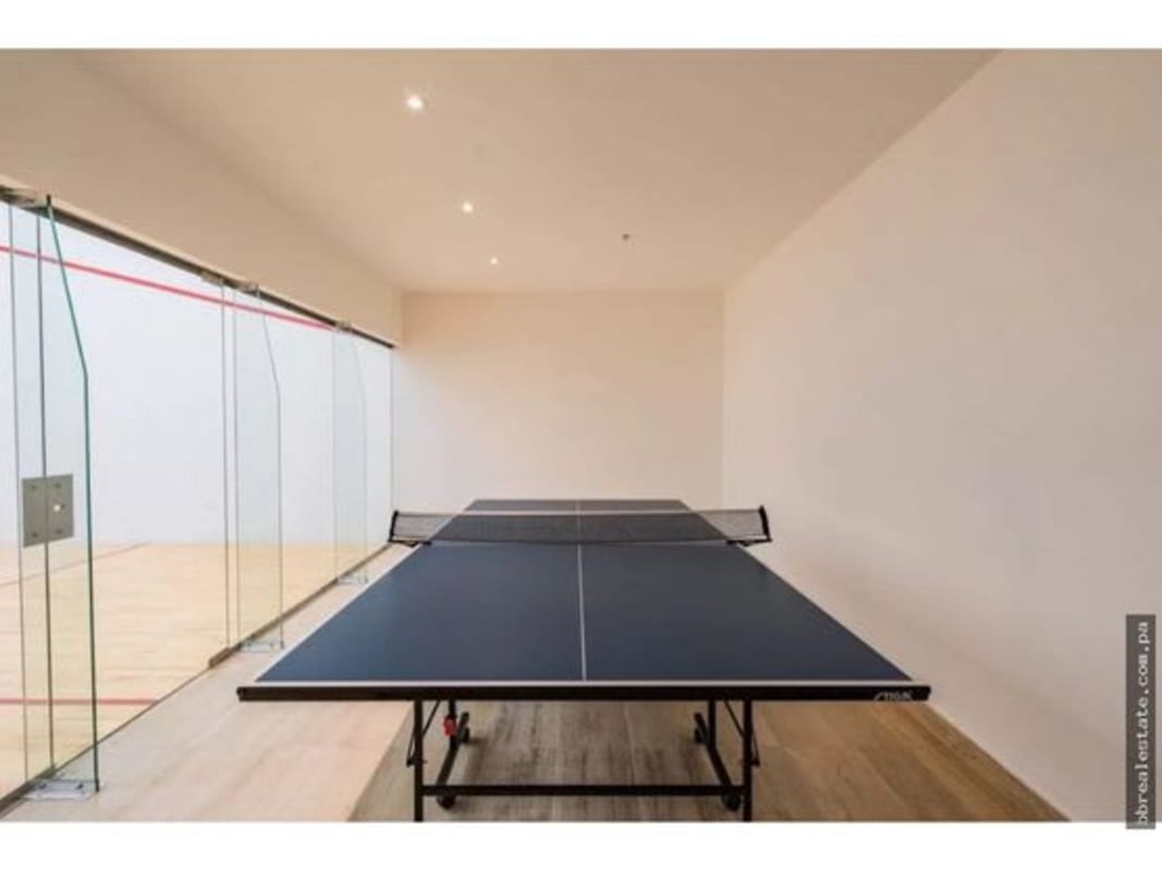 Spacious bedroom with built-in closets and ocean views at PH Aria Costa del Este Panama City