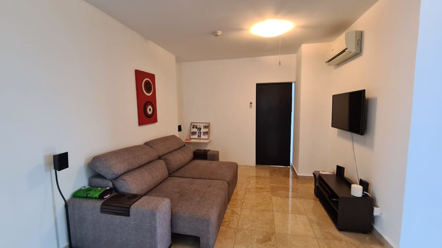 Modern minimalist living room with sectional marble floor TV PH Pearl on the Sea Panama