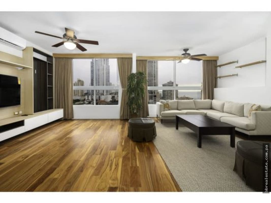 Bright living space with balcony access and ocean view in PH Pacific Star Punta Pacifica