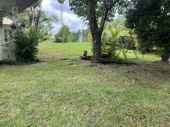 Covered terrace patio with seating space lush garden Bugaba estate