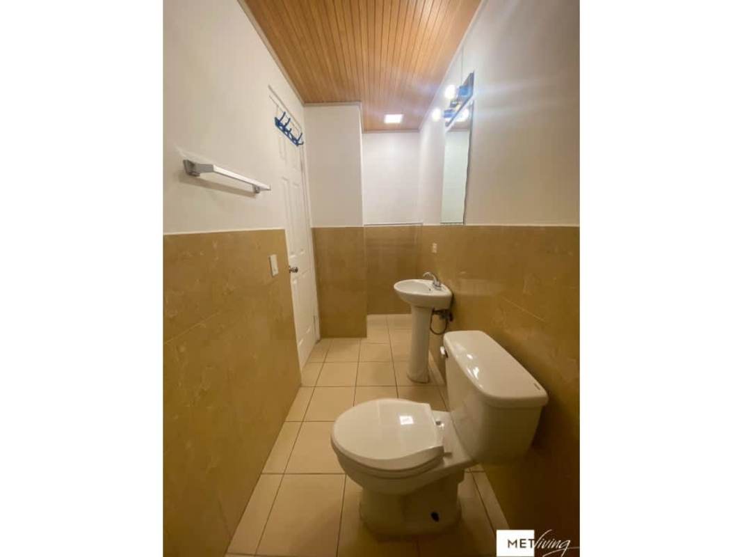 Bathroom with walk-in shower, pedestal sink, PVC wood style ceiling PH Parque Lefevre Panama