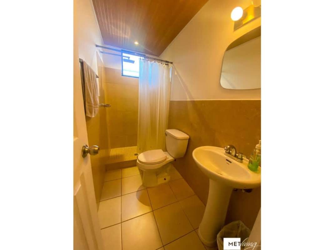 Bedroom with split AC, built-in closet, natural light in Parque Lefevre apartment Panama City