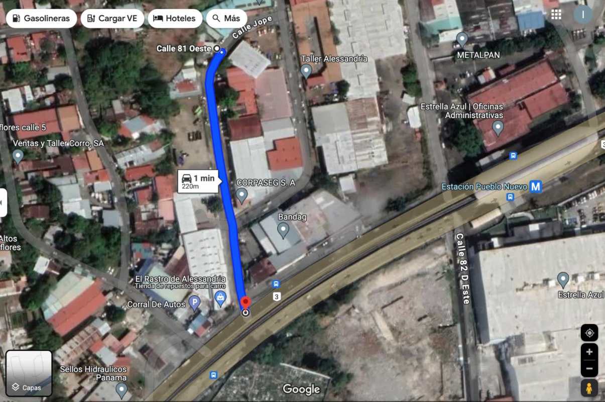 Satellite aerial view showing commercial warehouses, streets and metro station in Pueblo Nuevo Panama City