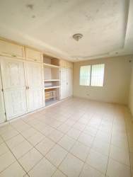 Bedroom with wardrobes shelving tiled floor Fuente del Chase La Chorrera Panama