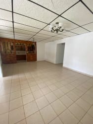 Spacious living area tiled floor wood partition chandelier in Fuente del Chase La Chorrera