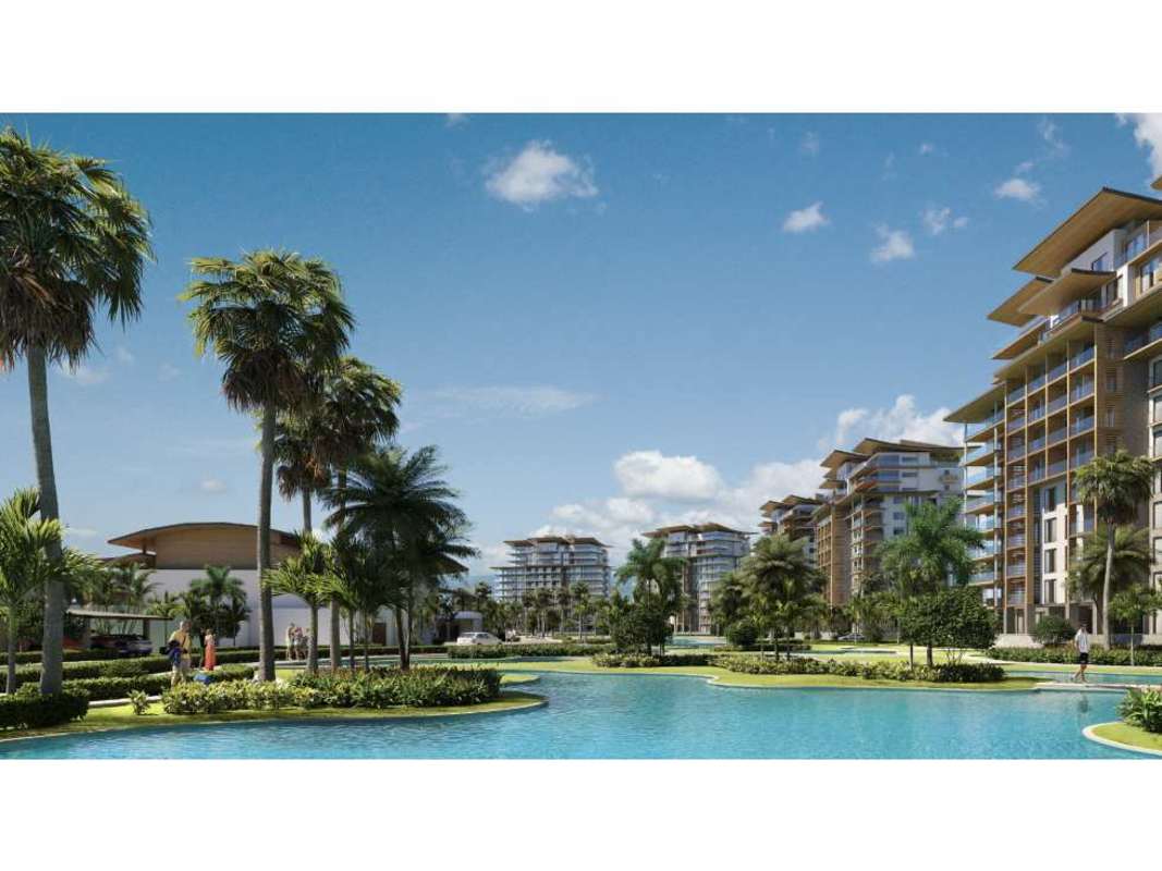 White sandy private beach with palapas in Playa Escondida Resort Panama.