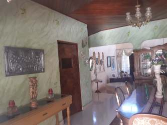 Large double-height terrace with arches and traditional tile in El Cocal Las Tablas Panama estate