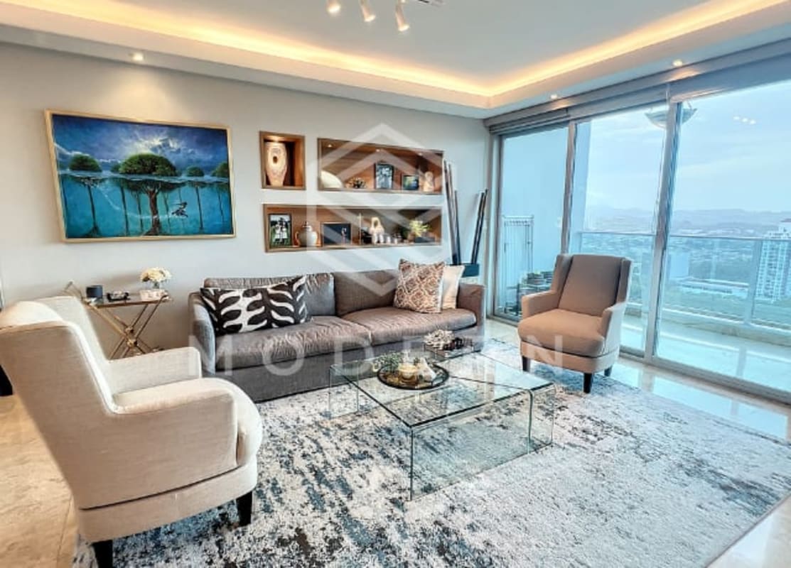 Elegant modern living room with sectional sofa, marble floors, large windows and city view in Pacific Point Costa del Este