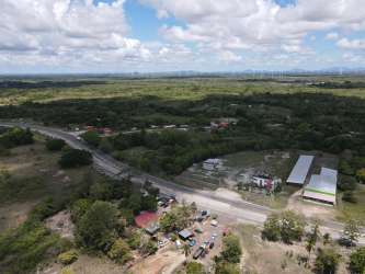 Large vacant field with industrial structures ideal for development Penonomé
