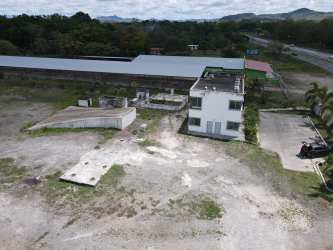 Two-story white office building on expansive fenced lot Penonomé Coclé