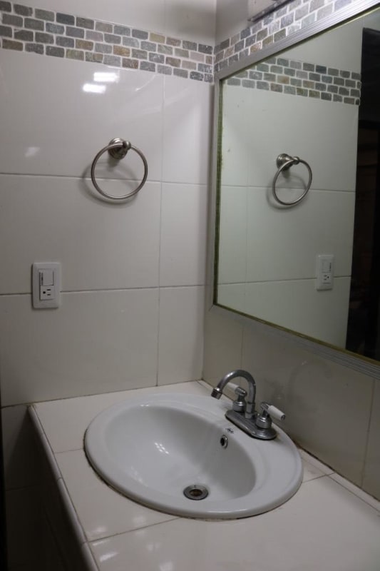 Living space with furnishings, TV, bathroom access PH 12 de Octubre Panama