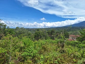 Single story house with tile roof near mountain landscape perfect countryside lifestyle Boquete Panama