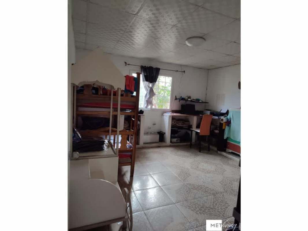 Bedroom featuring bunk bed, desk, tiled floor in countryside house in Utive Pacora Panama